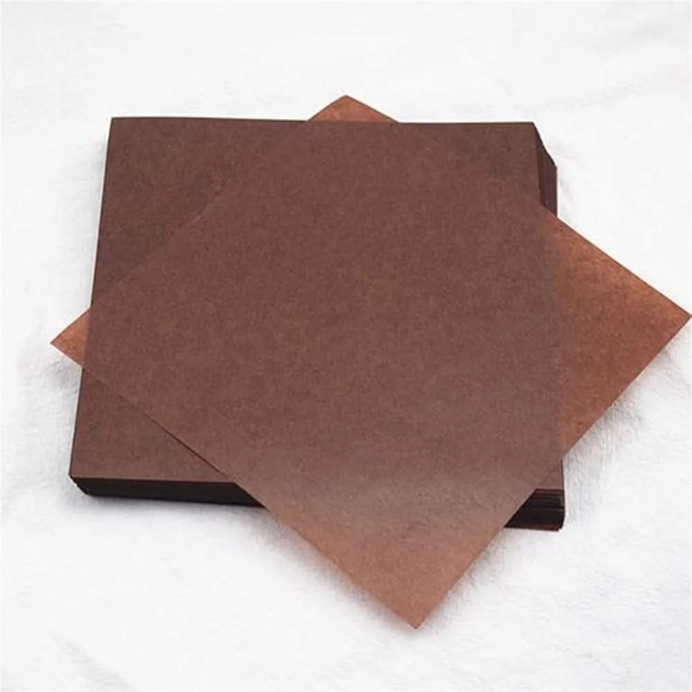 Stack of 100 square coffee-coloured wax paper sheets