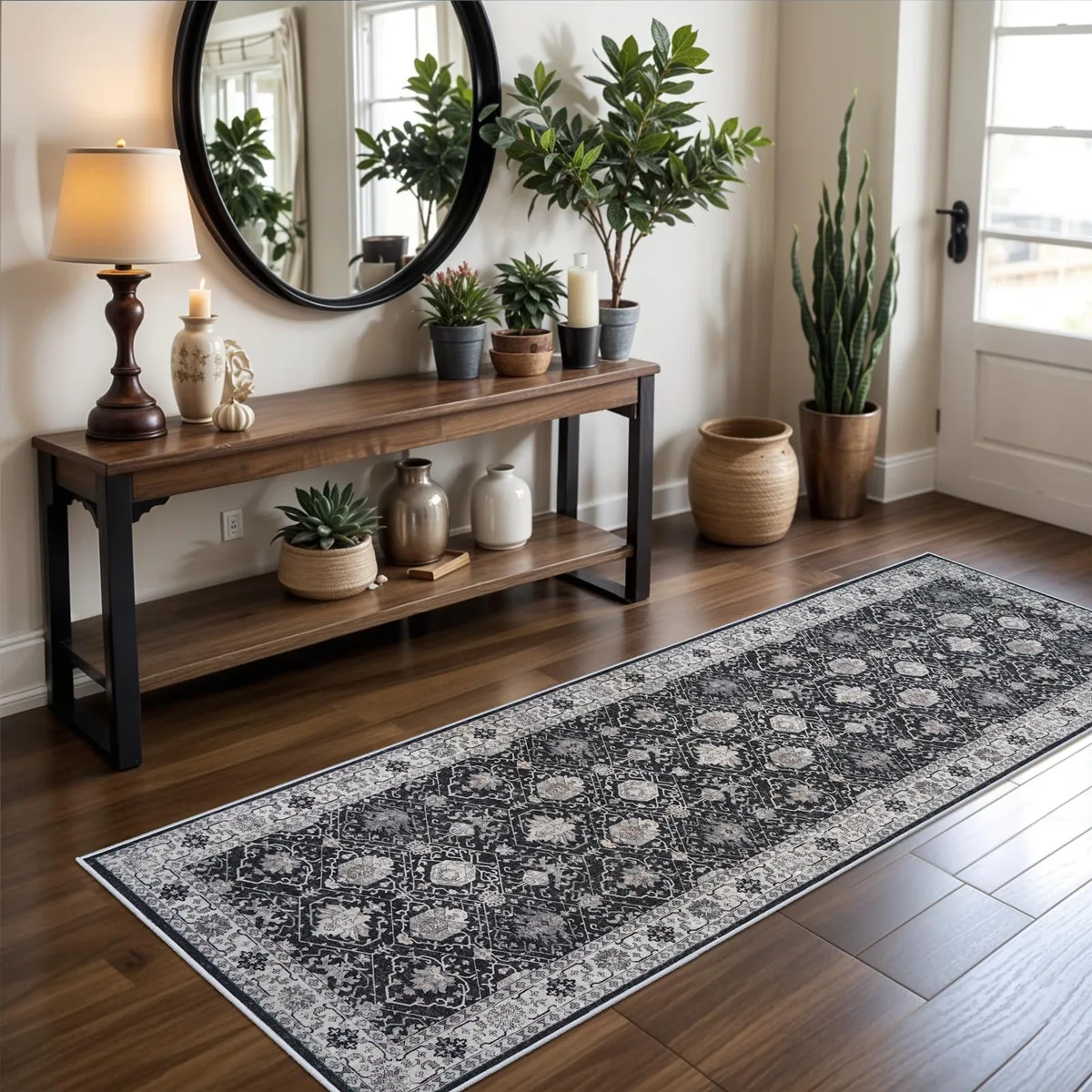Black rectangular runner rug with low-pile polyester surface and non-slip backing