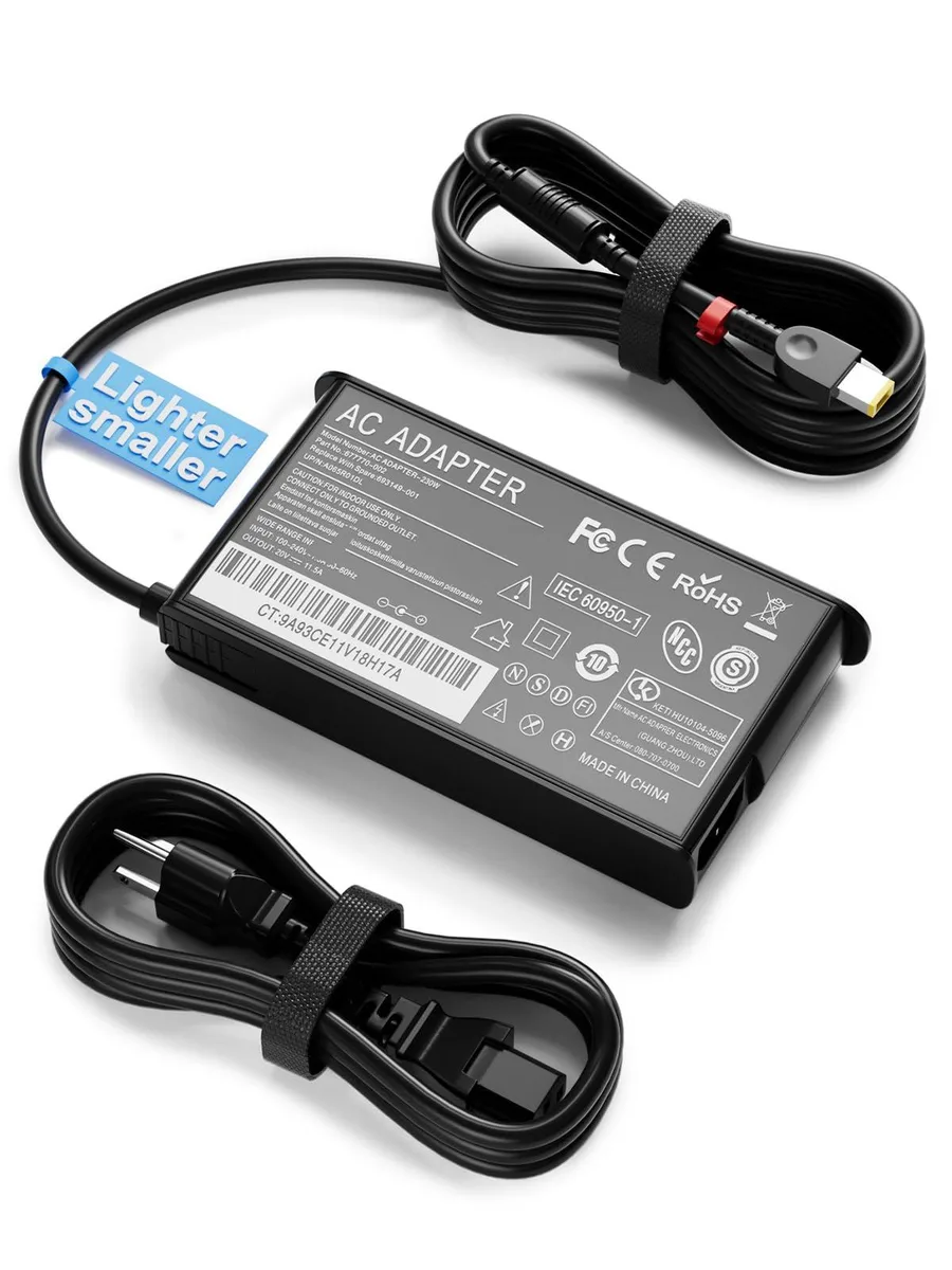 Black rectangular 230W AC adapter with square yellow tip and detachable power cord