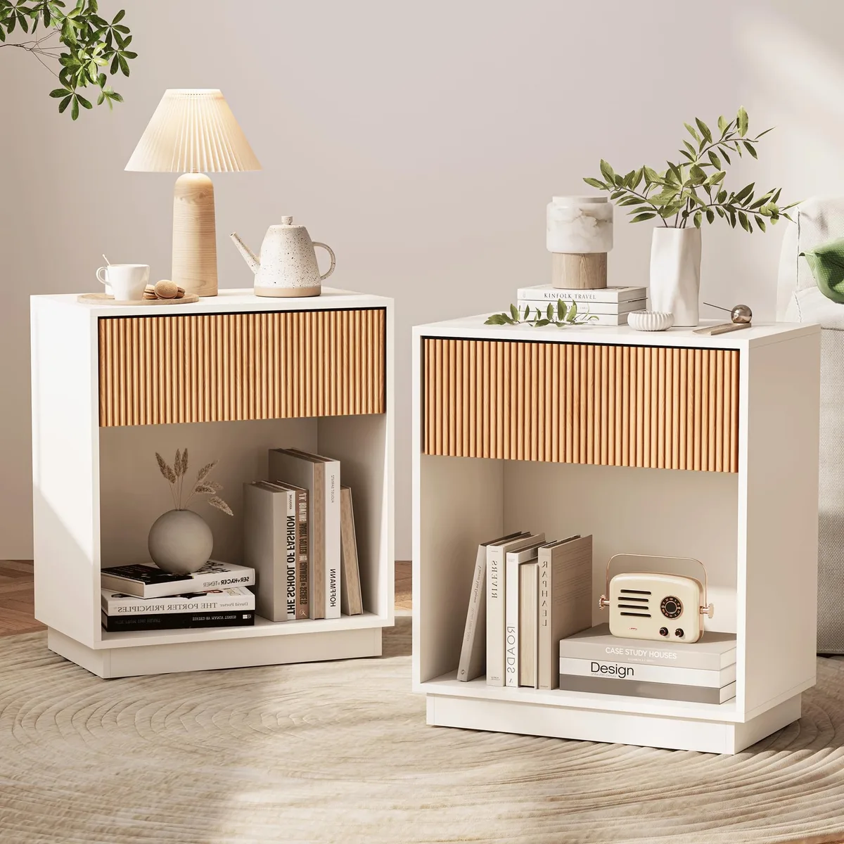 Two white nightstands with fluted drawer fronts and oak legs, set side by side