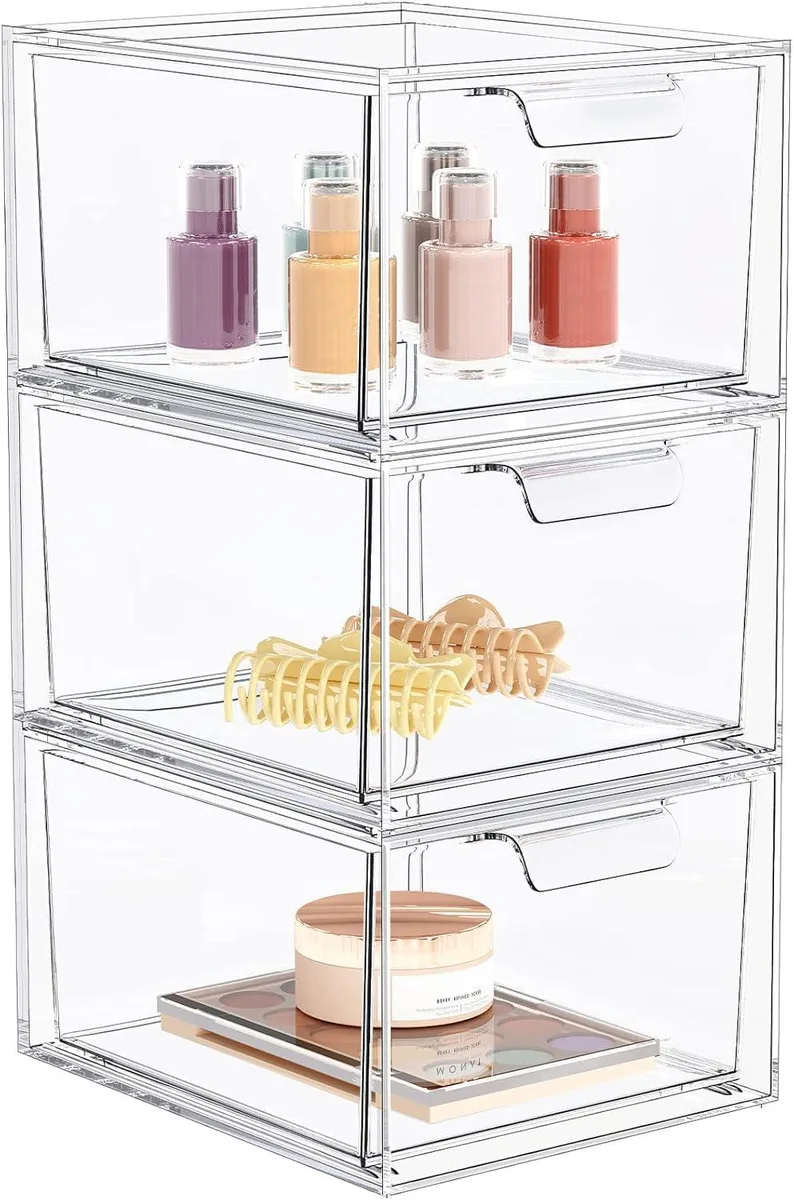 Three red plastic stackable drawers with pull handles, transparent fronts, rectangular shape