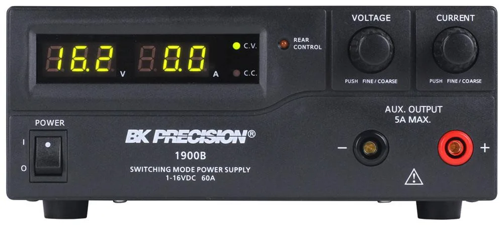 Grey rectangular bench power supply with front panel knobs and display