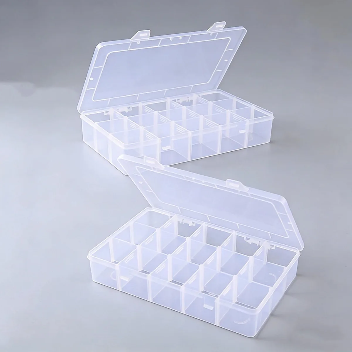 Two blue transparent polypropylene boxes with snap lids, 15 compartments each