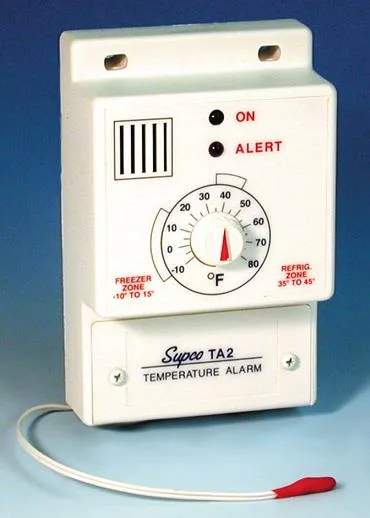Compact white temperature alarm unit with sensor wire and power cord