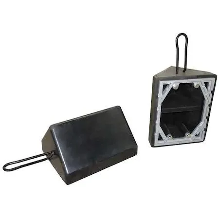 Black rubber wheel chock with steel grab handle, smooth tread and ice cleat base