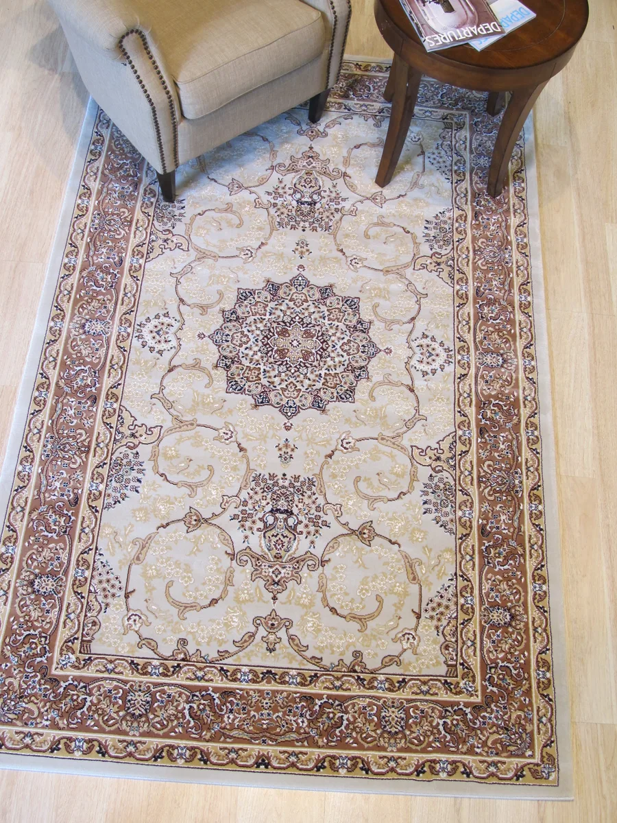 Beige oriental Tabriz rug with ivory floral medallion pattern on polypropylene pile