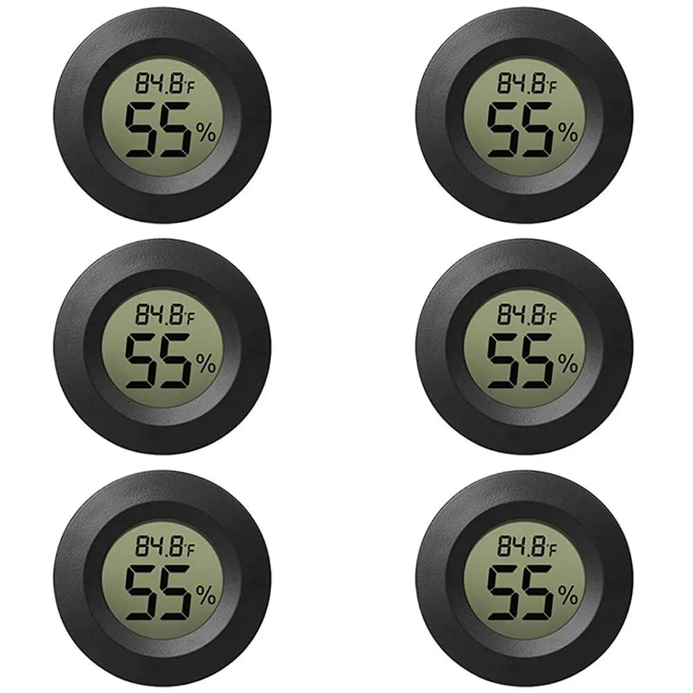 Six small black round digital hygrometer thermometers with LCD screens