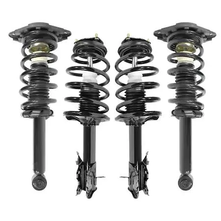 Four silver strut assemblies with coil springs and top mounts