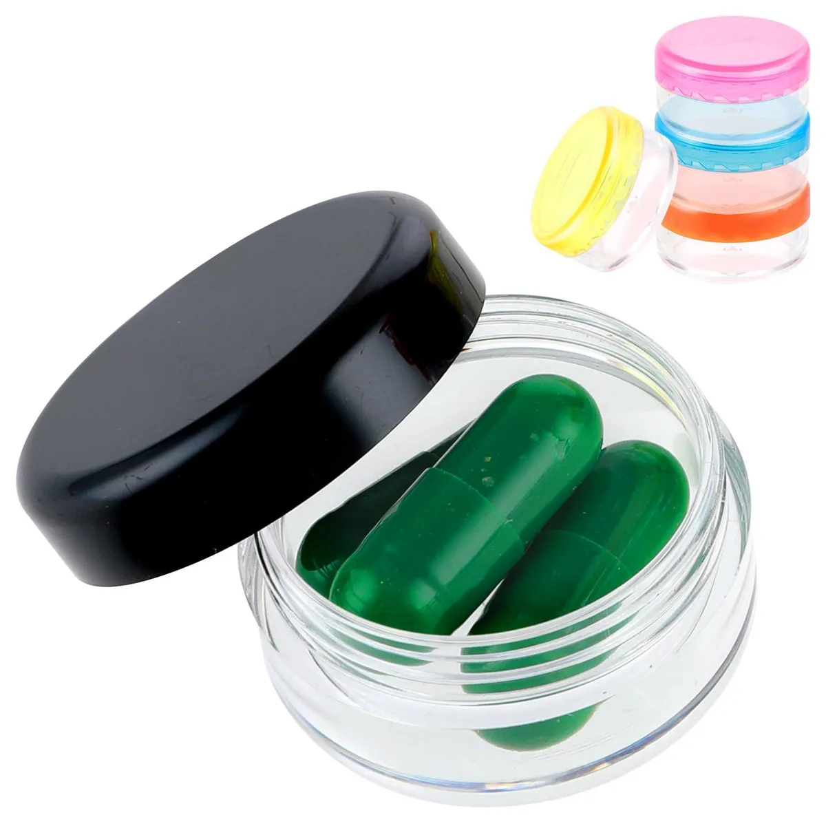 Five small coloured pill boxes with screw caps