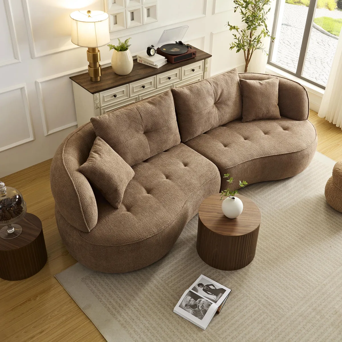 Camel fabric combo sofa with four detachable pillows, curved silhouette, solid wood legs