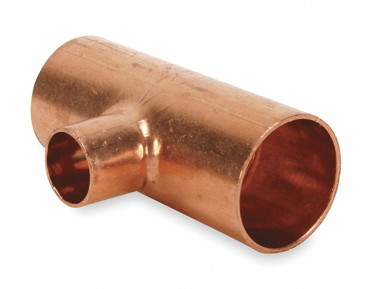 Copper reducing tee fitting with three sweat connections in a T shape