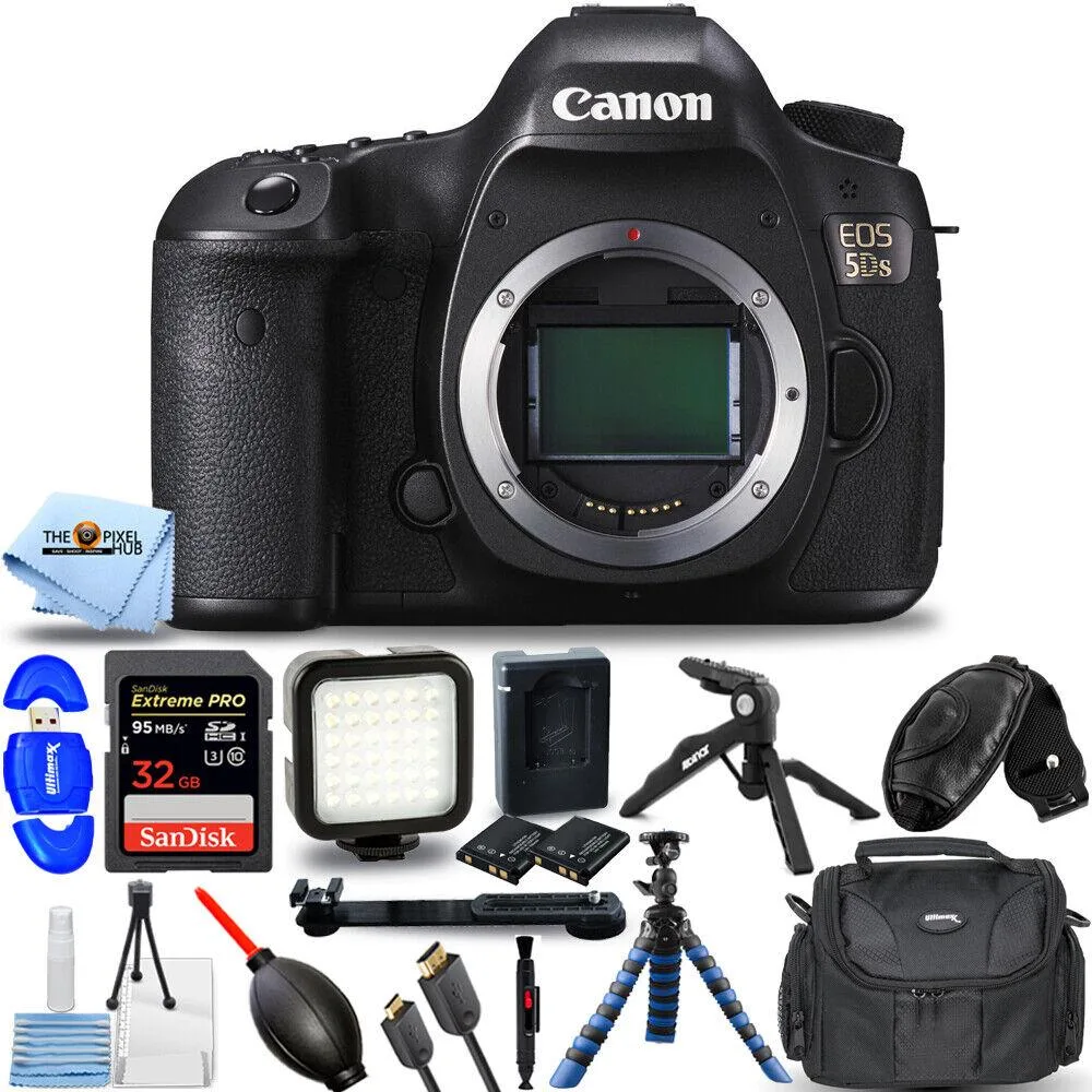 Black Canon EOS 5DS DSLR body with 12 accessories including blue tripod and LED light