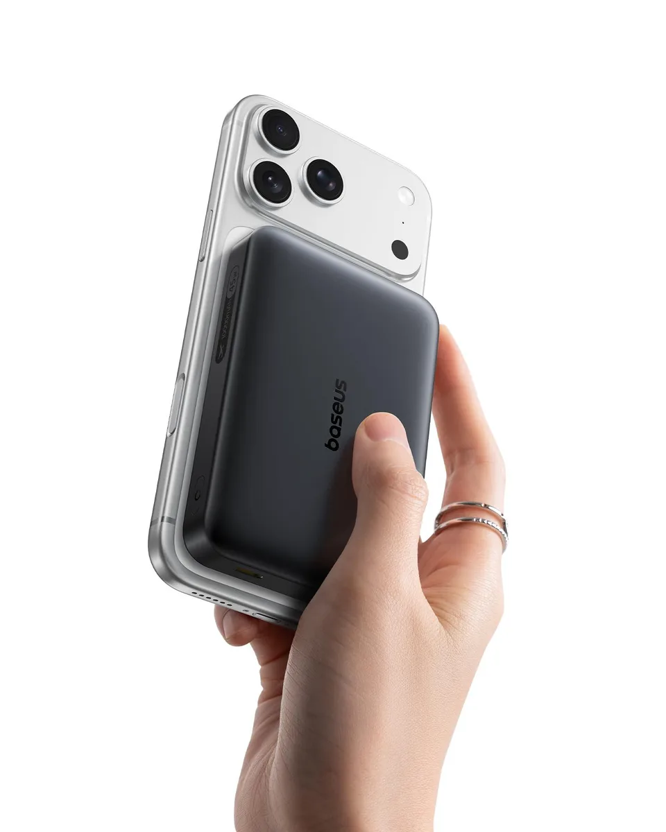 Black rectangular power bank with rounded edges and built-in USB-C cable, 4.0 by 2.6 by .5 inches