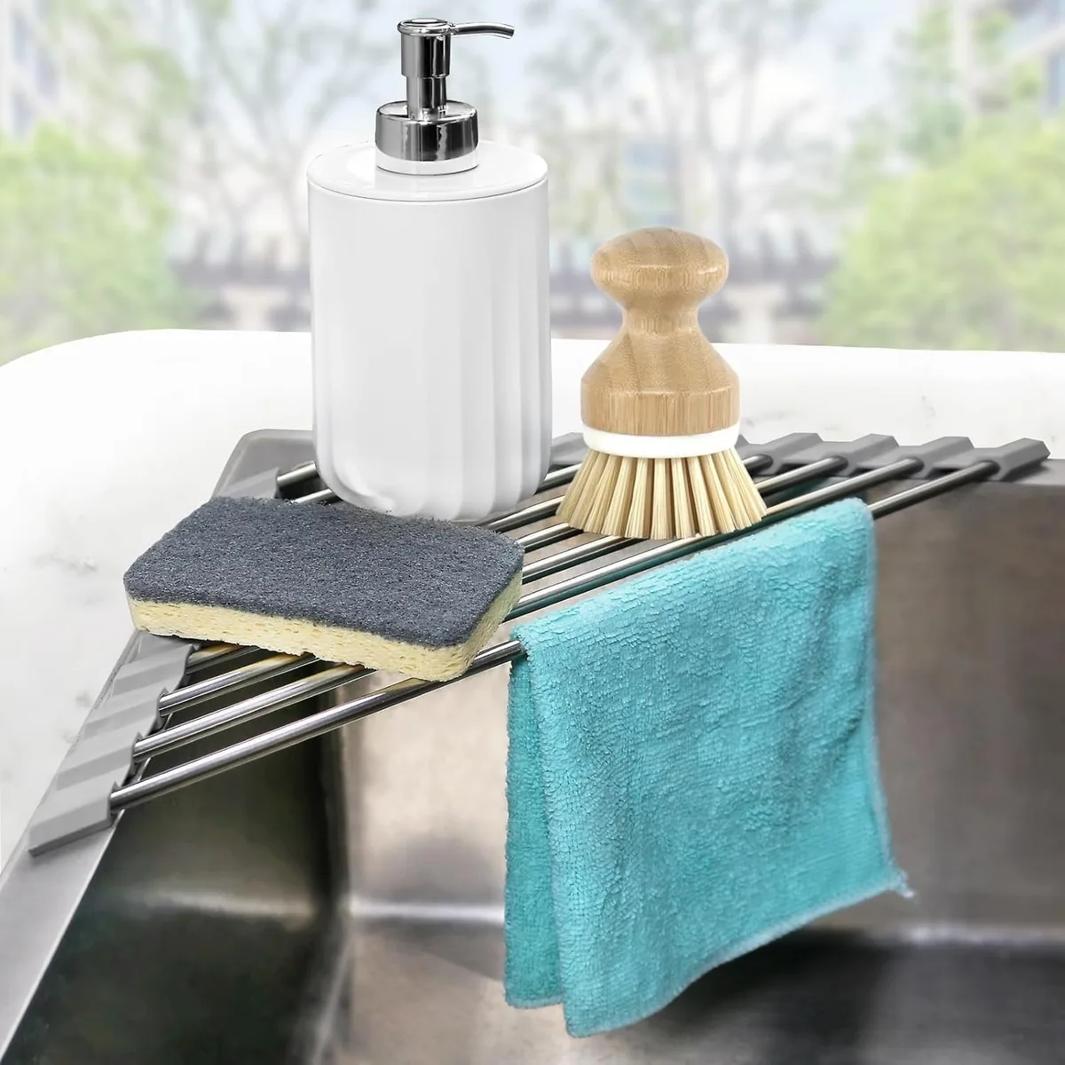Red triangular two-tier sink caddy with stainless steel bars and silicone grips, foldable design