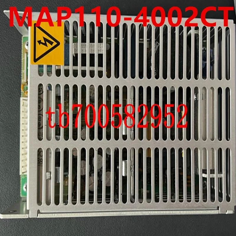 Rectangular silver ATX power supply unit with cooling fan visible on one side