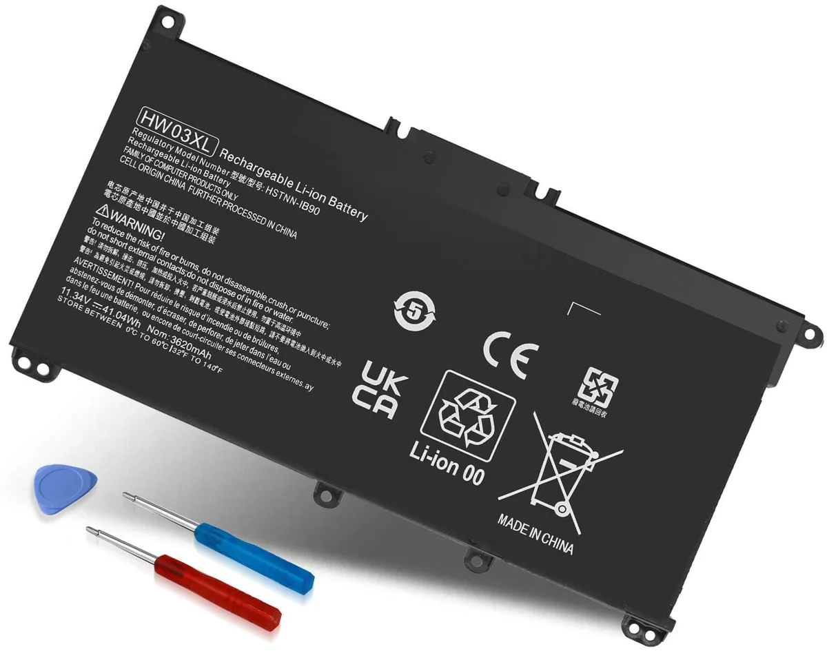Rectangular black laptop battery with screwdrivers and instruction sheet