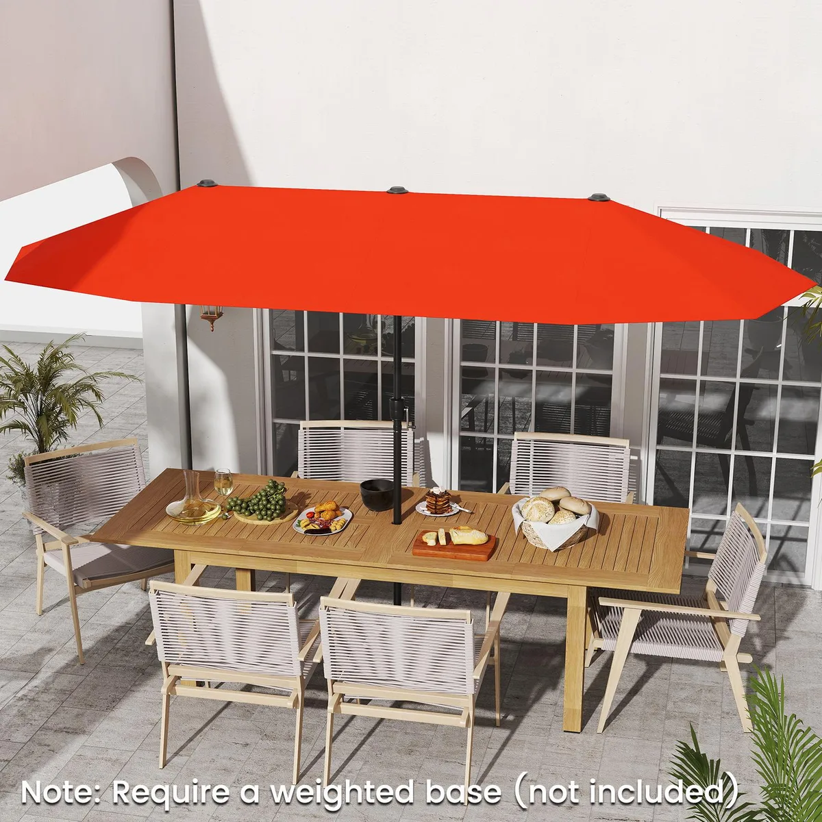 Large orange double-sided patio umbrella with crank handle and metal ribs