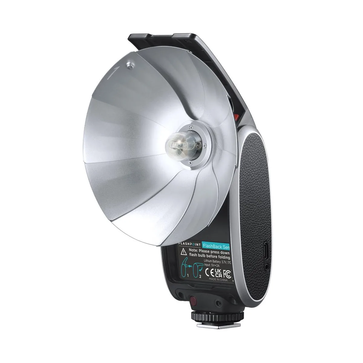 Compact black on-camera flash with folding silver reflector dish, opens from 5 x 2.5 x 2 inch clamshell