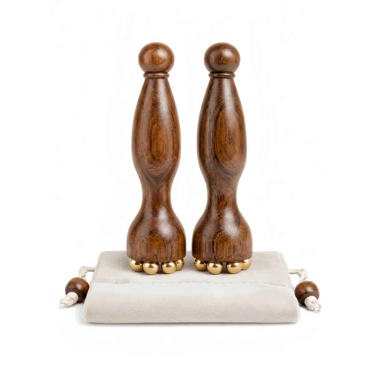 Two small wooden handheld tools, one with a smooth ball, the other with five copper beads