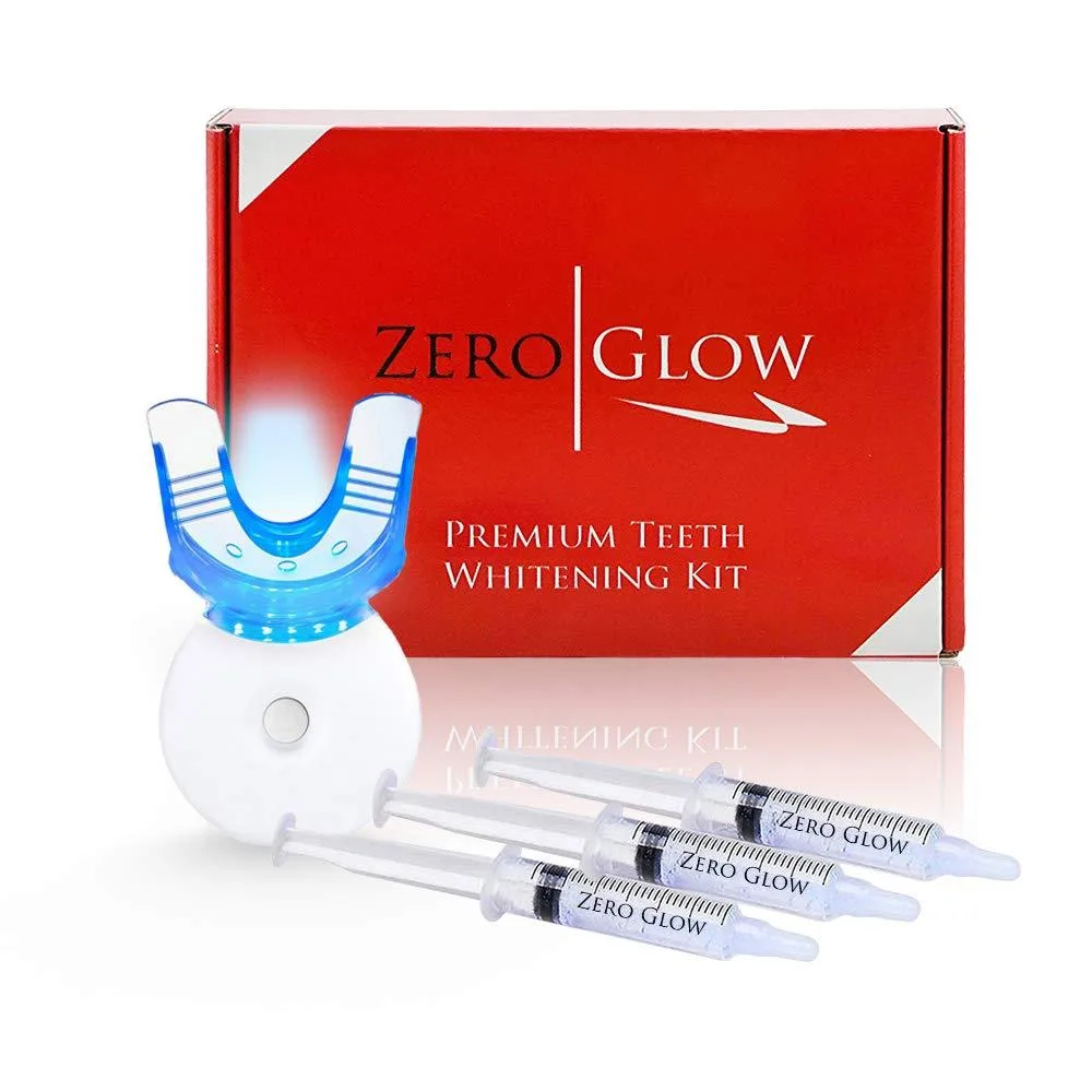 White boxed kit with three gel syringes, mouth tray, and LED light
