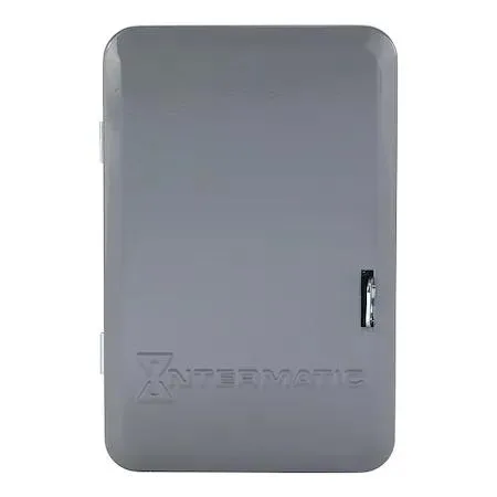 Grey metal box with a white dial and black trippers