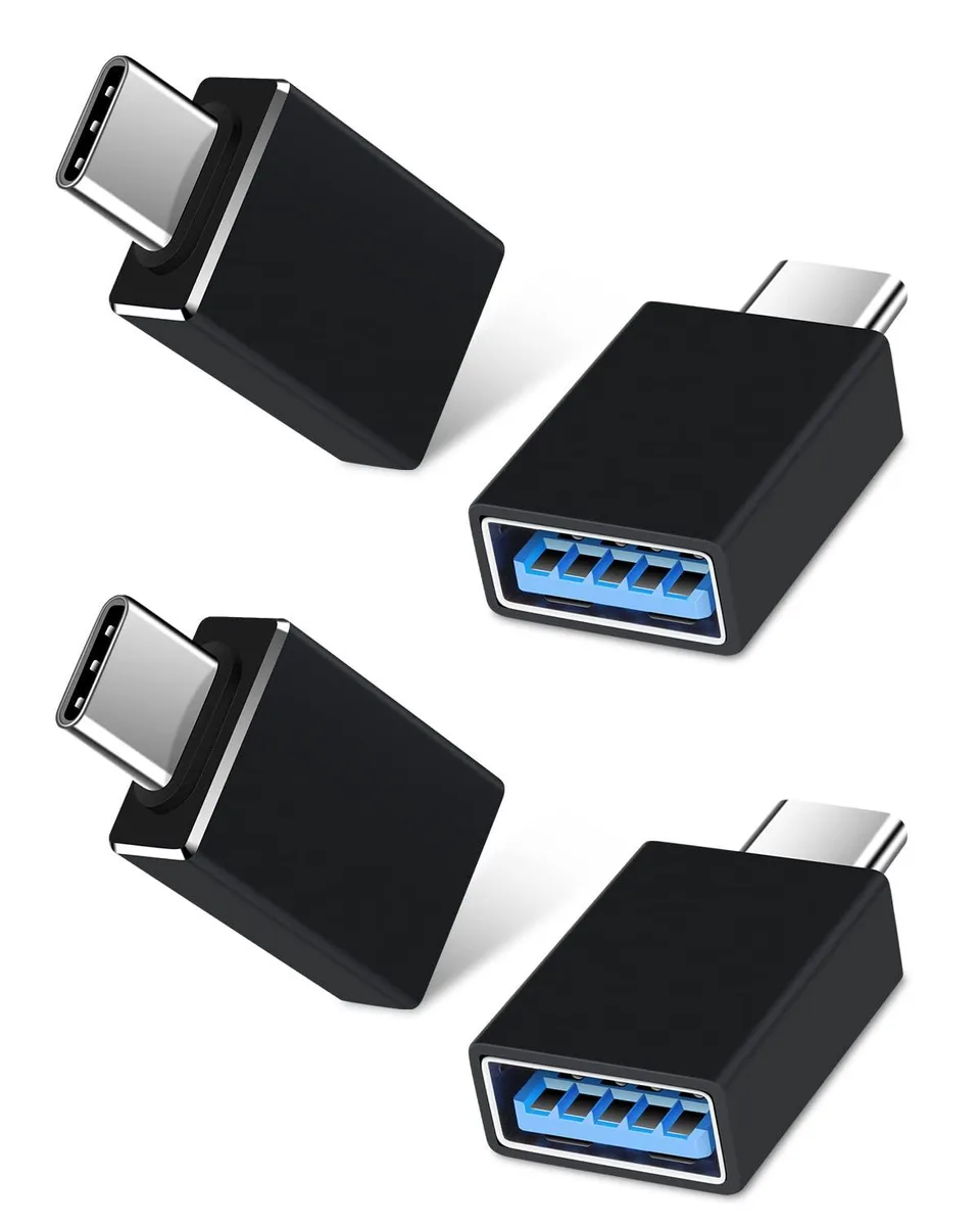 Four black USB-C male to USB-A female adapters side by side