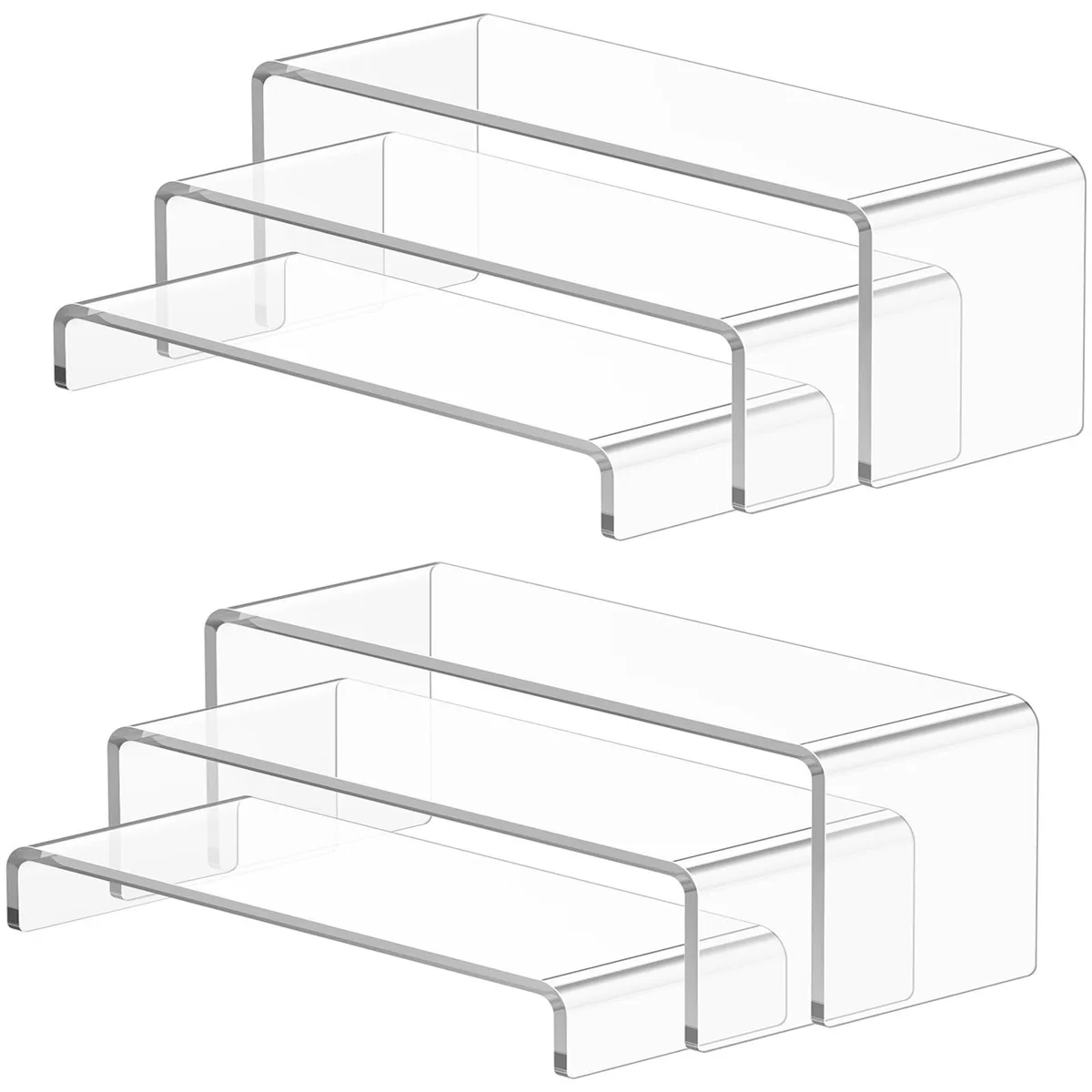 Six clear acrylic rectangular risers in three graduated heights, smooth polished edges