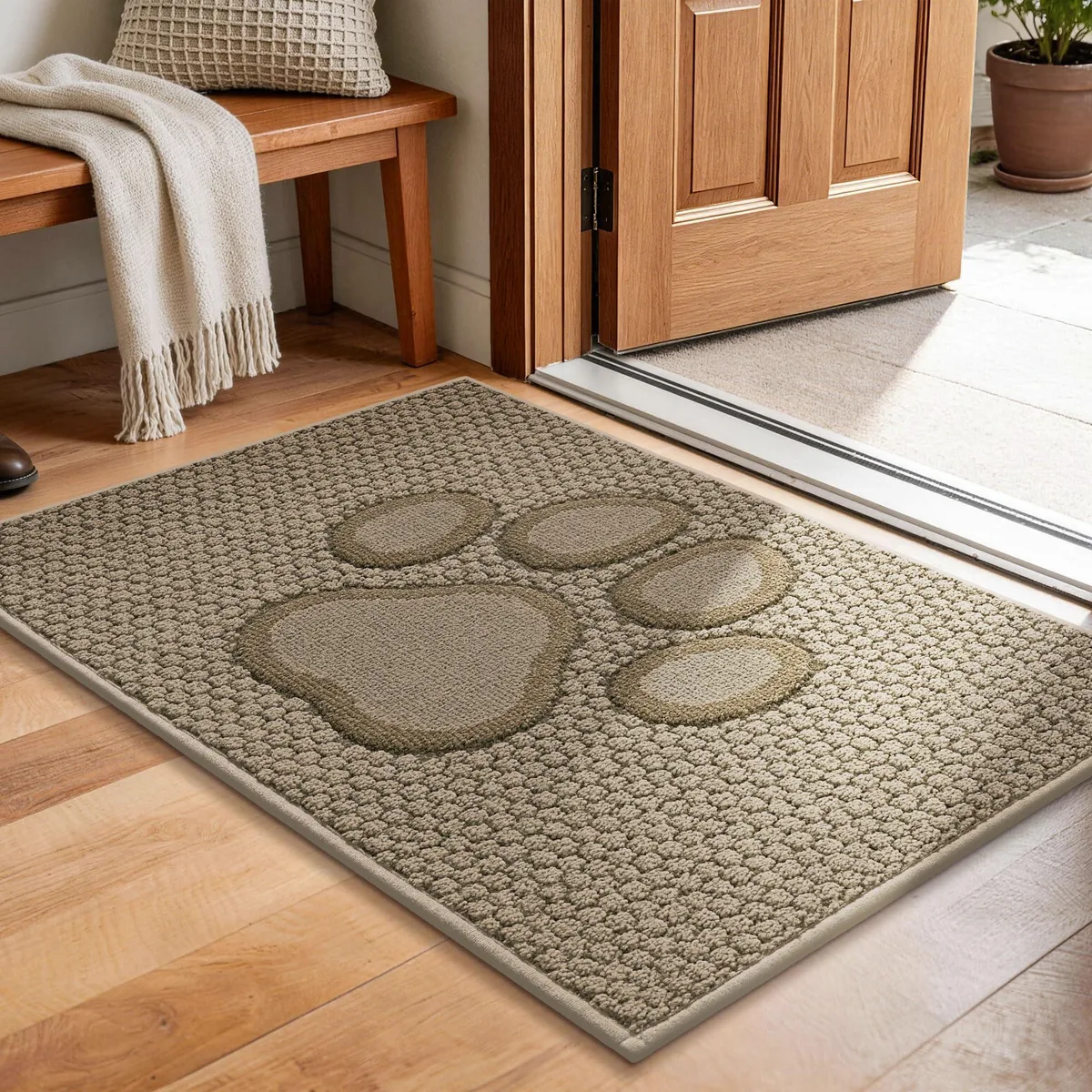 Beige rectangular door mat with paw print pattern, 20 by 32 inches, low profile with rubber backing
