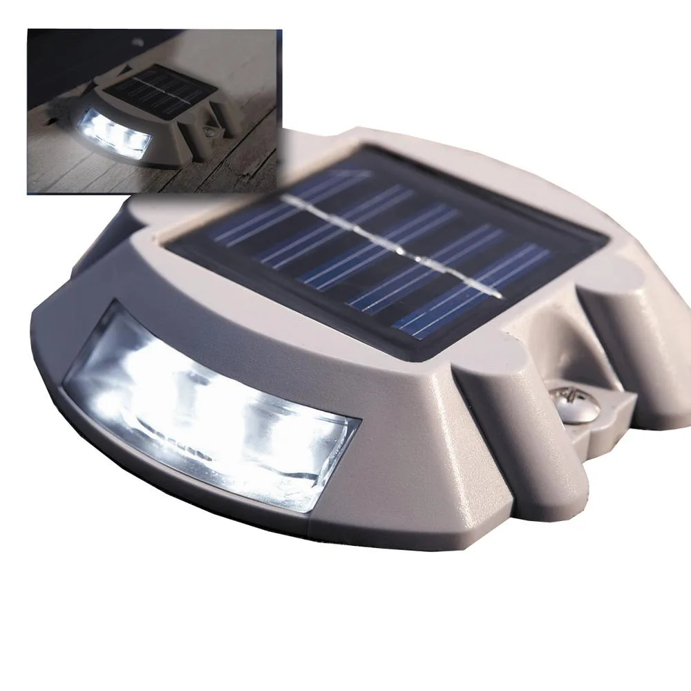 Small rectangular solar dock light with flat top panel and low-profile dark housing
