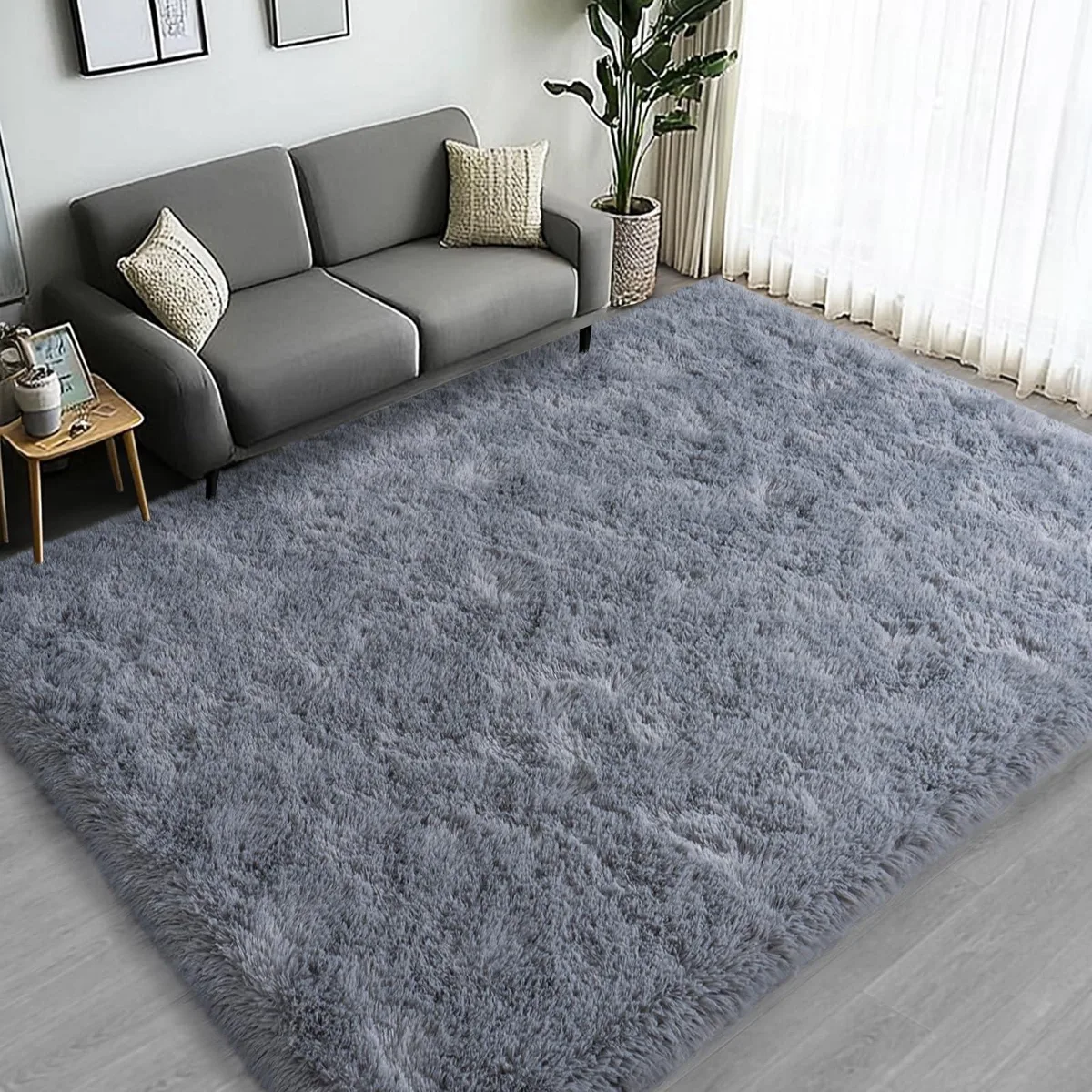Grey rectangular shag rug with deep fluffy pile and non-slip backing