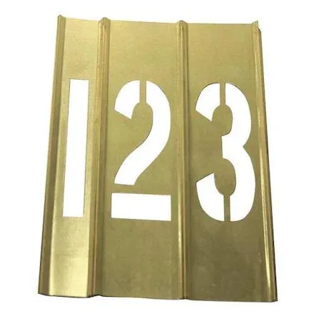 Brass stencil kit with fifteen interlocking characters in yellow finish
