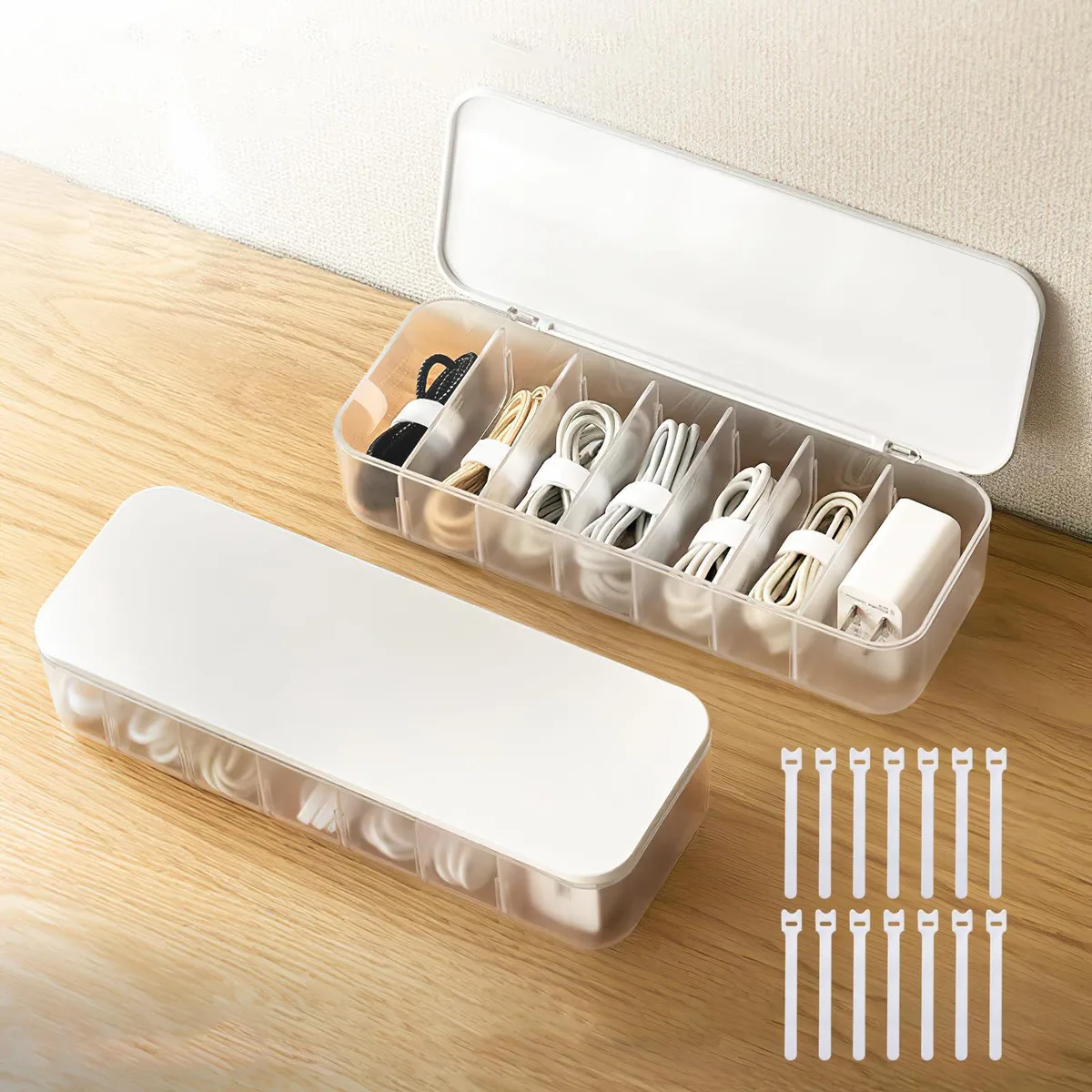 Two white plastic cable organiser boxes with lift-off lids and fourteen white cable ties