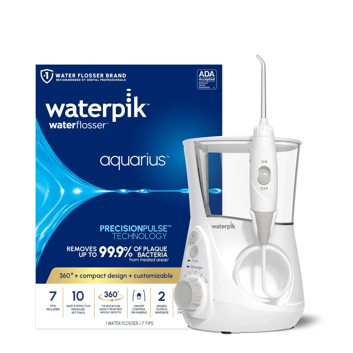 White countertop water flosser with large reservoir and multiple tips