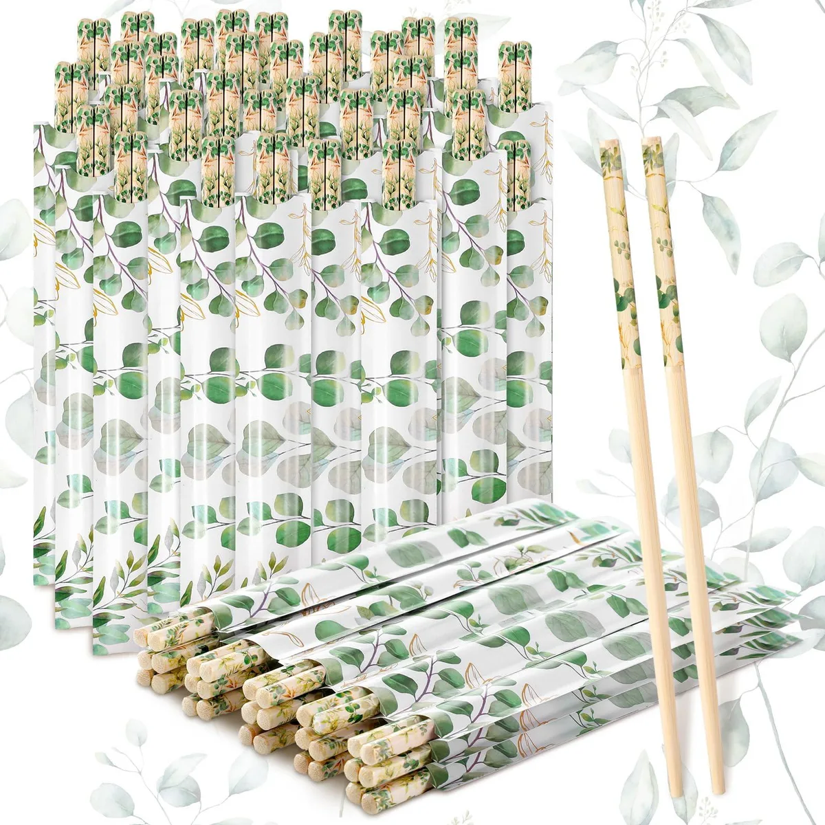 Fifty pairs of light wood chopsticks in blue floral paper sleeves, 22 cm long