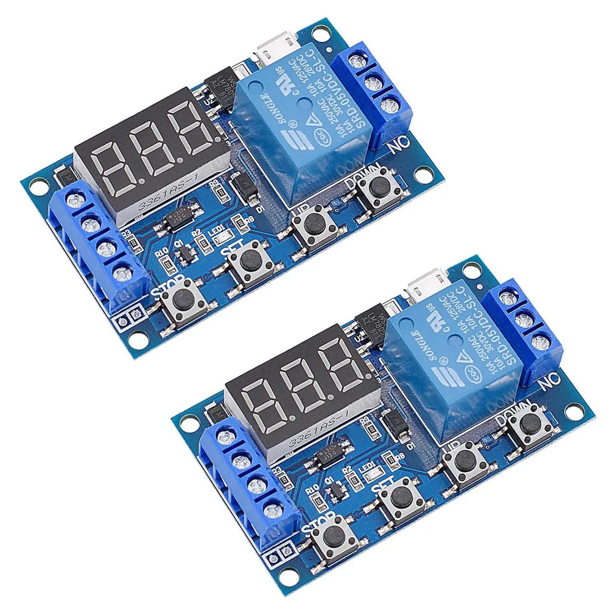 Two small green circuit boards with LED displays and relay modules side by side