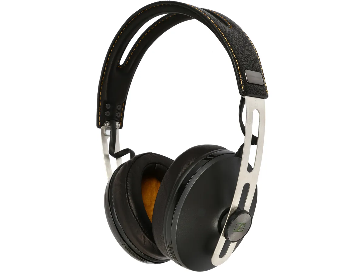 Black over-ear wireless headphones with leather headband and ear pads, stainless steel frame, foldable design, carrying case included