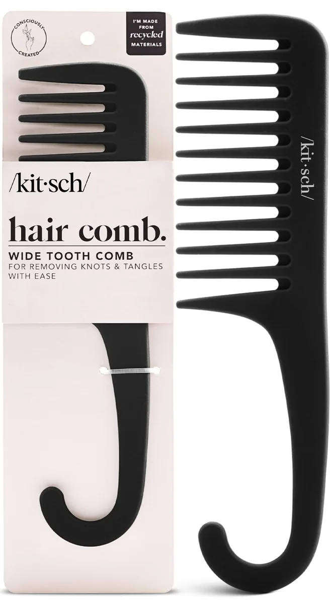 Black wide-tooth comb with curved rubber handle, rectangular shape, recycled plastic teeth