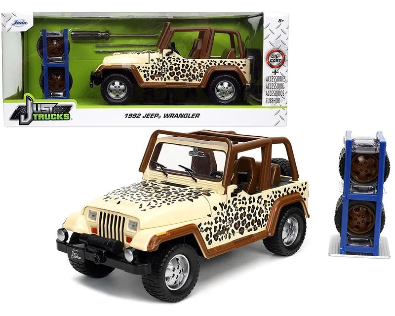 Jada Jada 1992 Jeep Wrangler Tan and Brown with Graphics and Extra Wheels "Just Trucks" 1/24 Diecast Vehicle — product photo