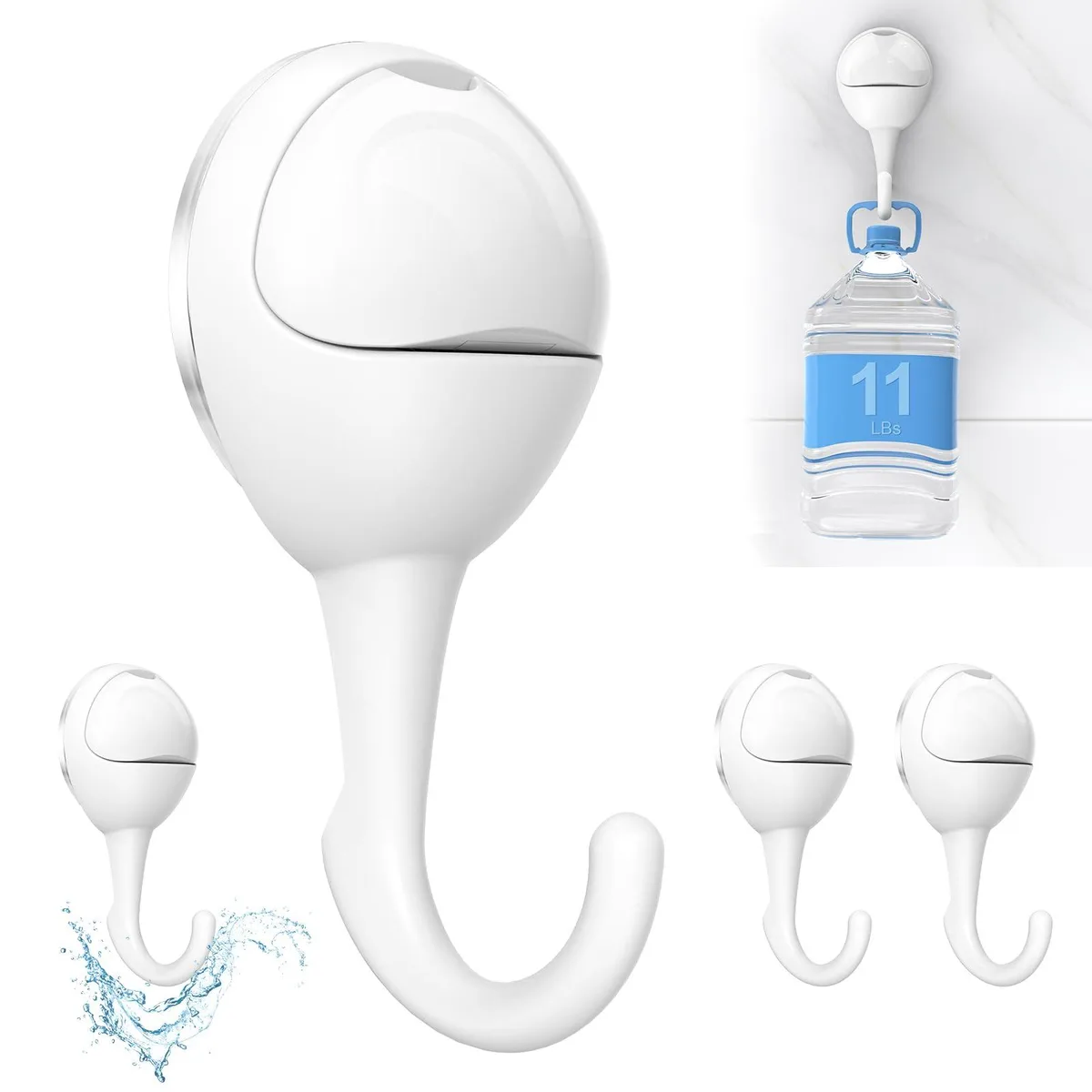Four white J-shaped suction hooks on a clean surface