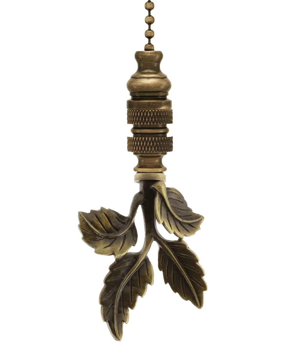Antiqued metal leaf-shaped finial on 12-inch beaded chain, 3-inch height