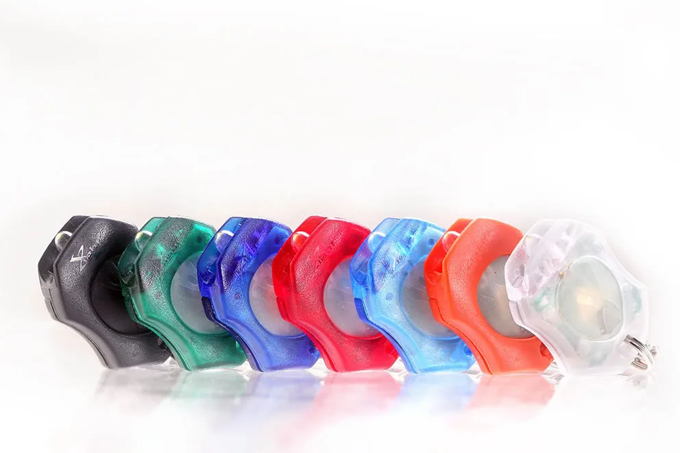 Seven tiny keychain lanterns in assorted translucent colours on a ring