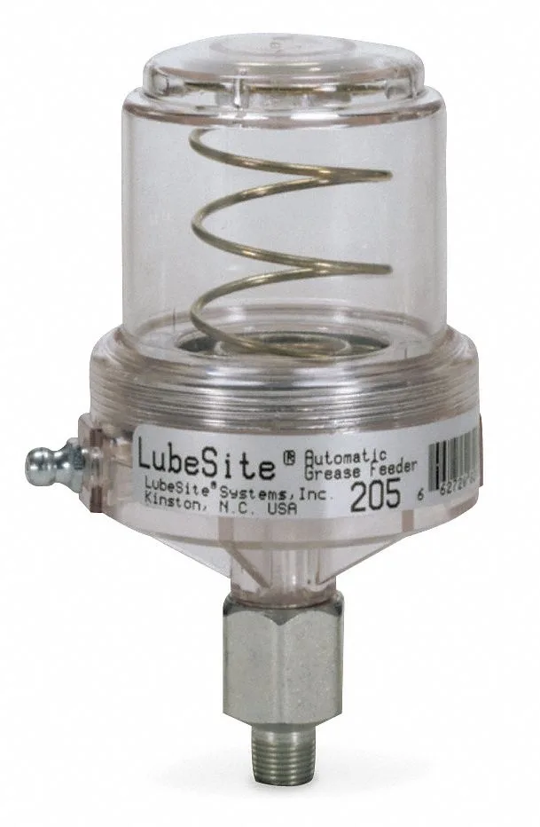 Clear polycarbonate cylinder, red grease visible, NPT fitting, spring-loaded continuous feeder
