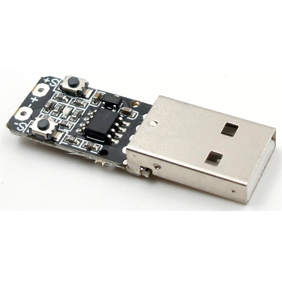 Small green circuit board with USB Type-A plug and voltage selection pins