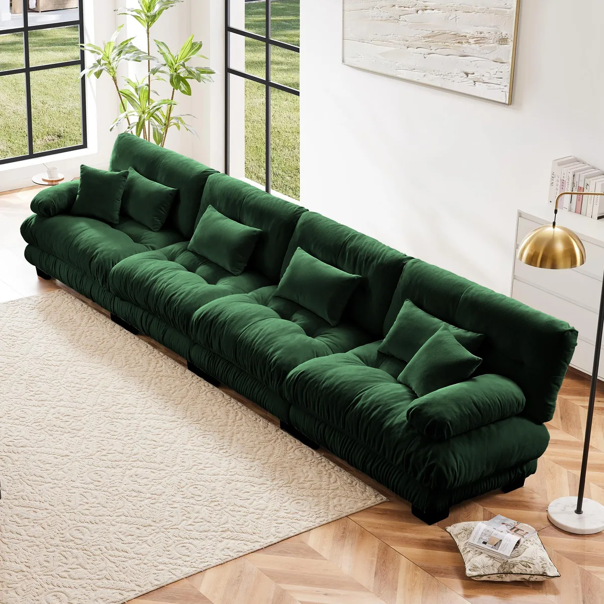 A green chenille four-seat sectional sofa with rounded bolster armrests and deep seat cushions