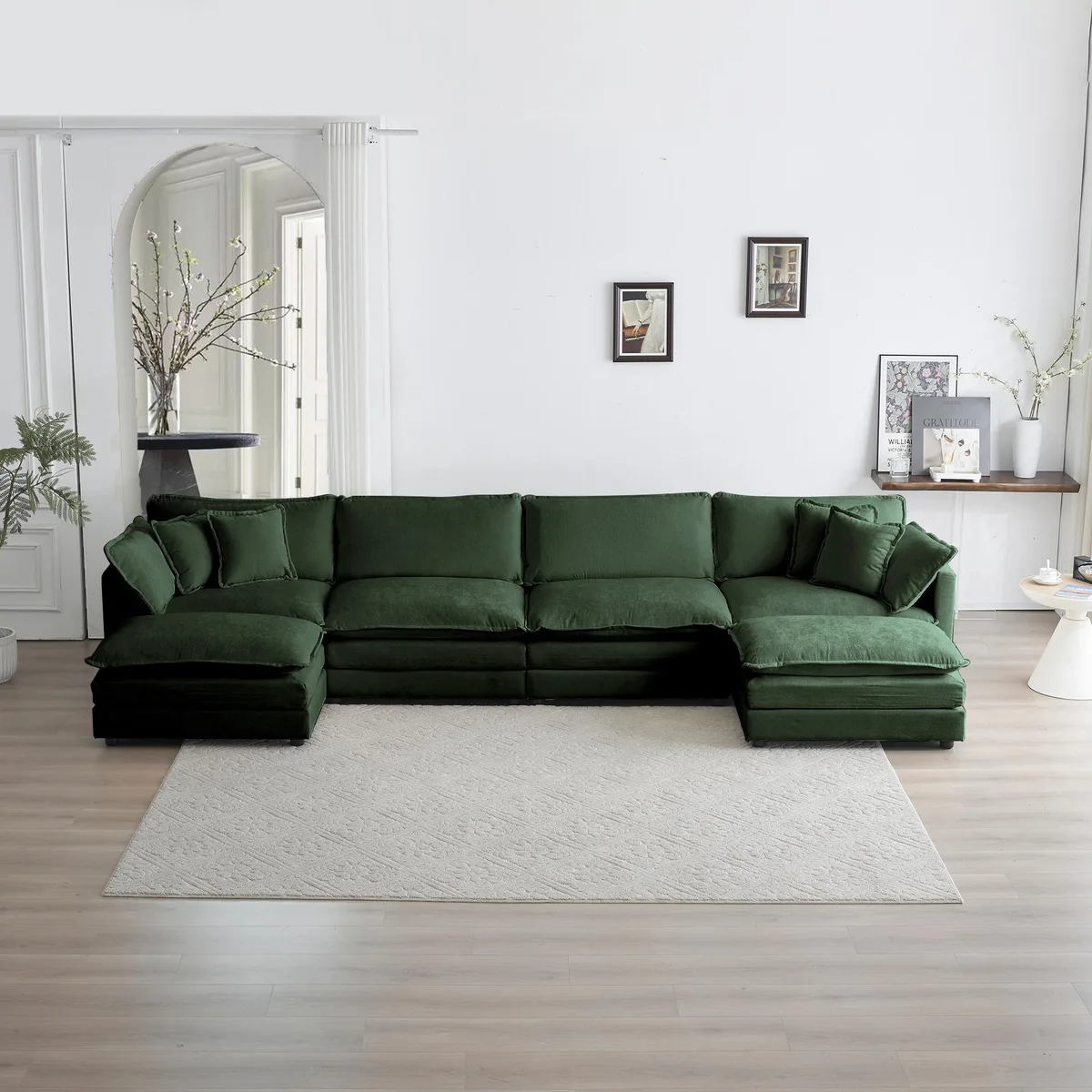 Green chenille U-shaped sectional with reversible chaise and two ottomans