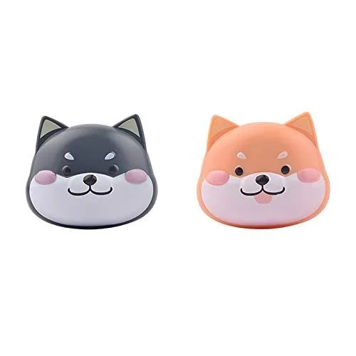 Two grey dog-shaped contact lens cases with mirror bottle tweezers stick remover tool