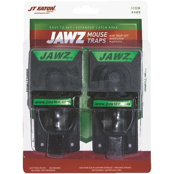 Two black and green plastic snap mouse traps side by side