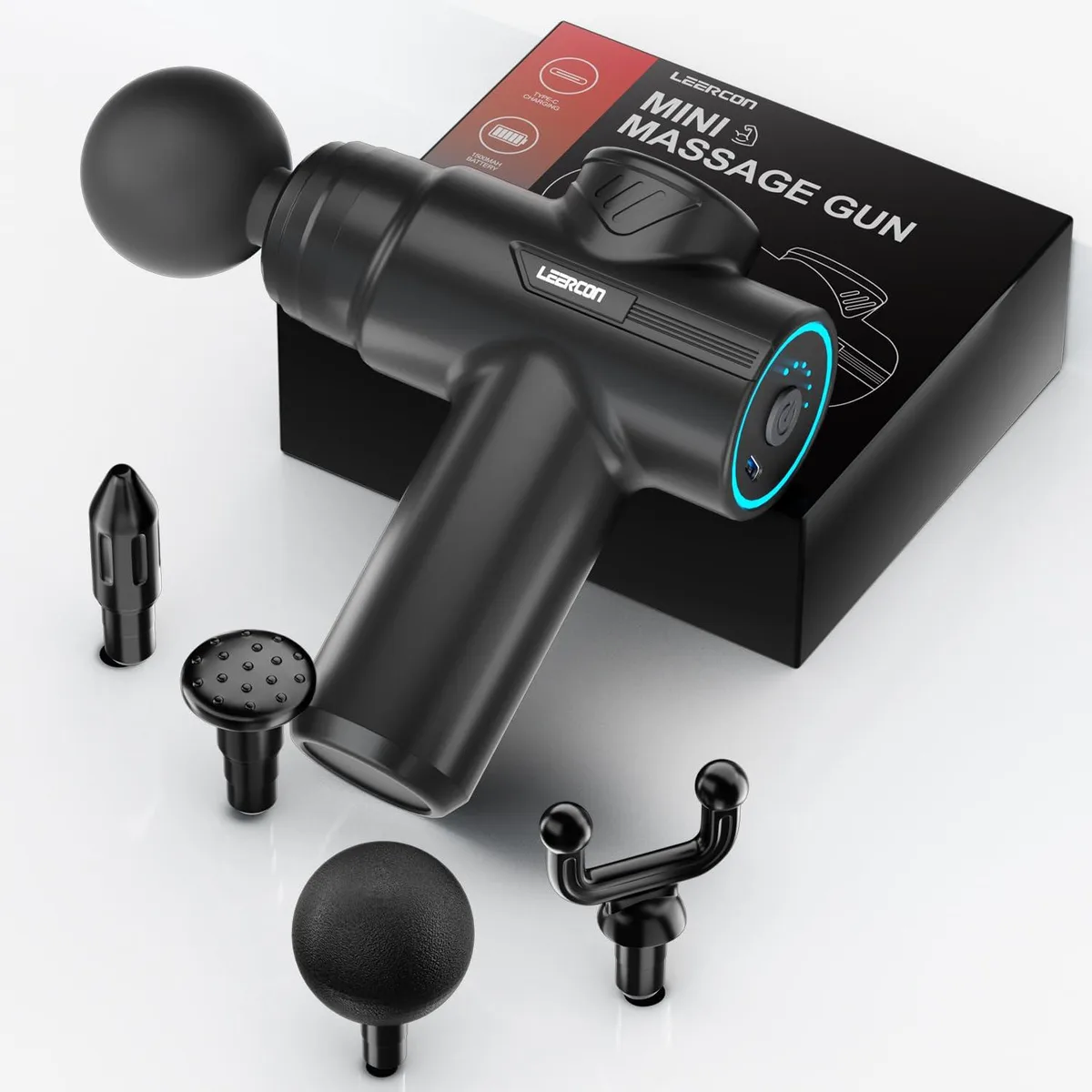 Compact blue massage gun with ergonomic handle and four interchangeable heads