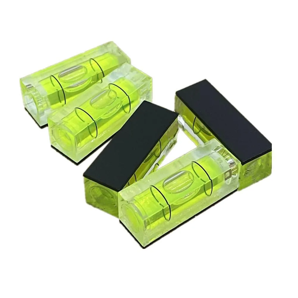 Five small square acrylic bubble levels green with magnetic backs