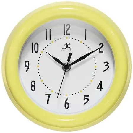 Yellow plastic wall clock with white face and black hands